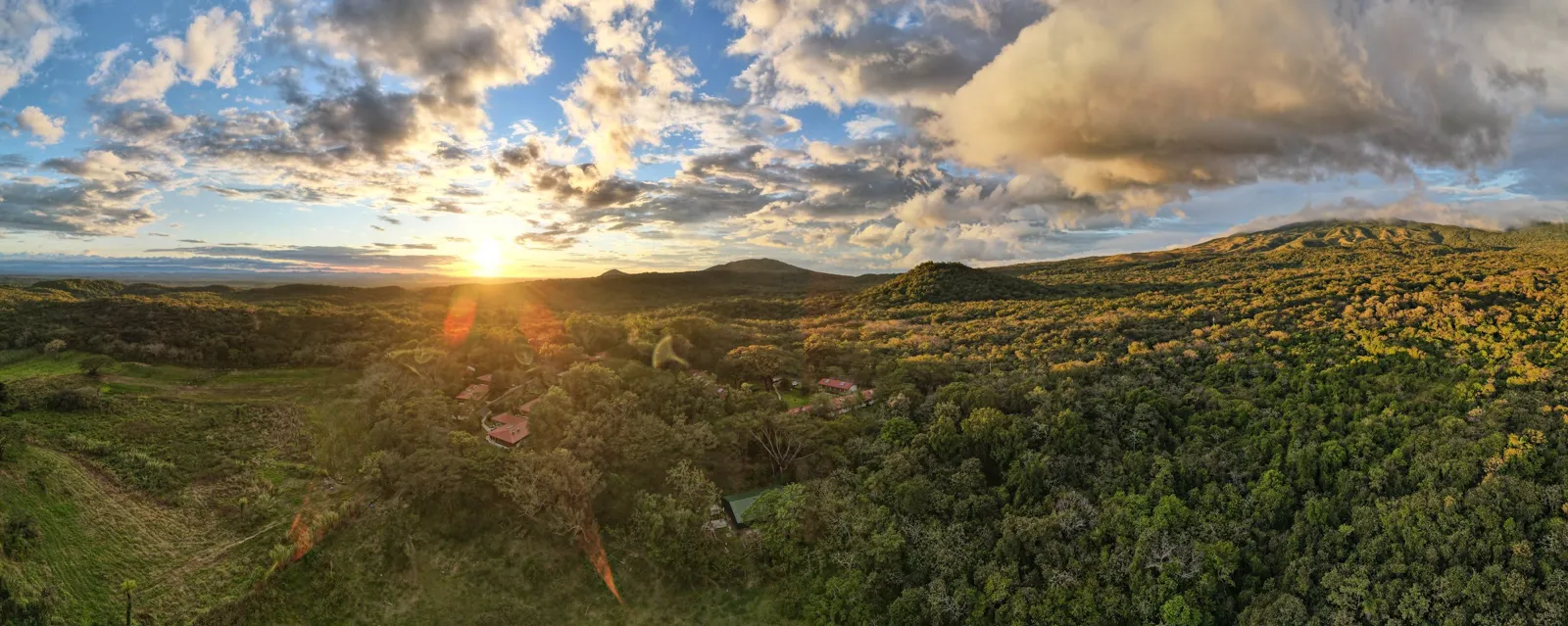 Sunset over forested hills, Rincón de la Vieja area, Guanacaste